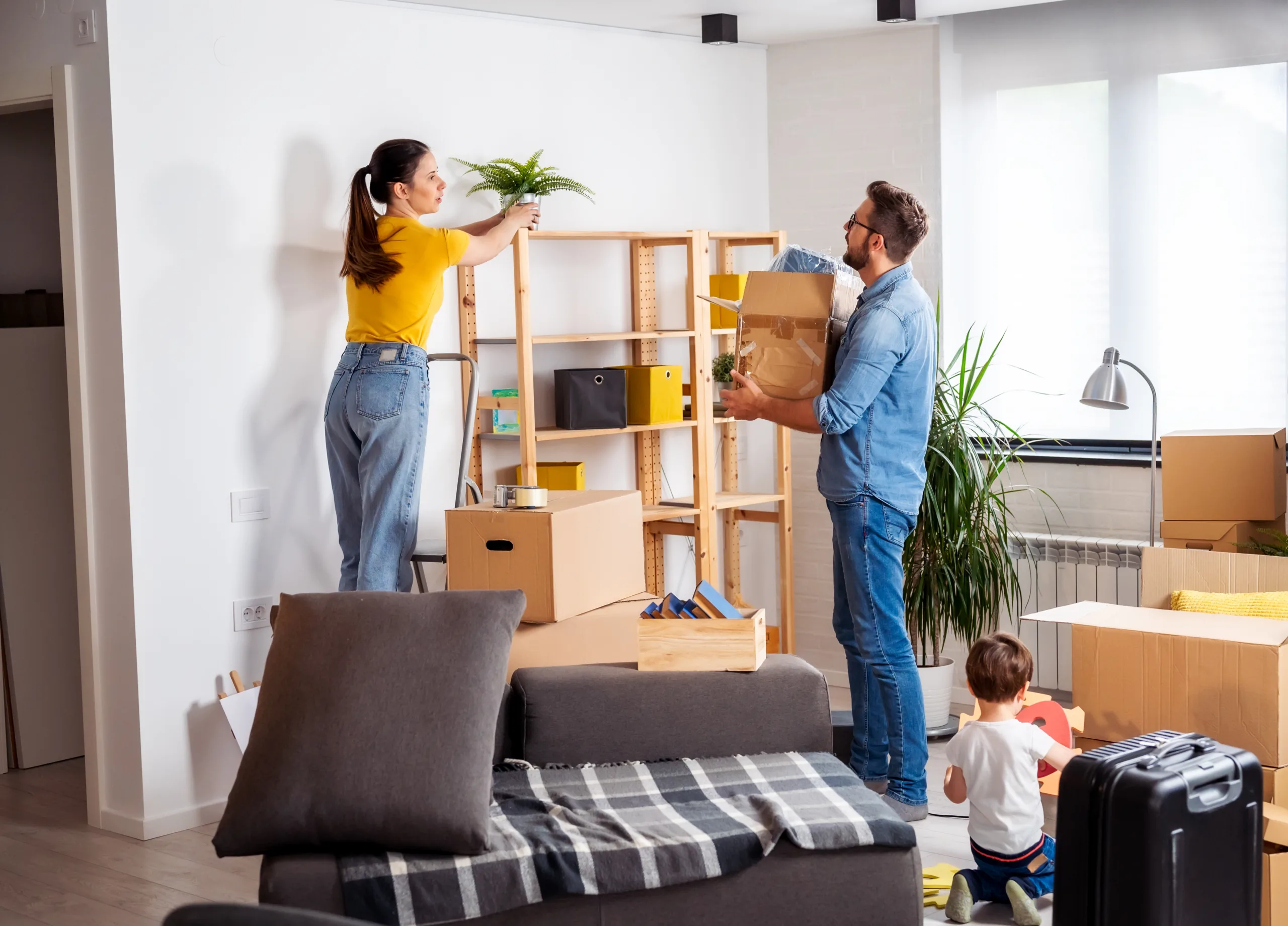 A young family moving into their new home