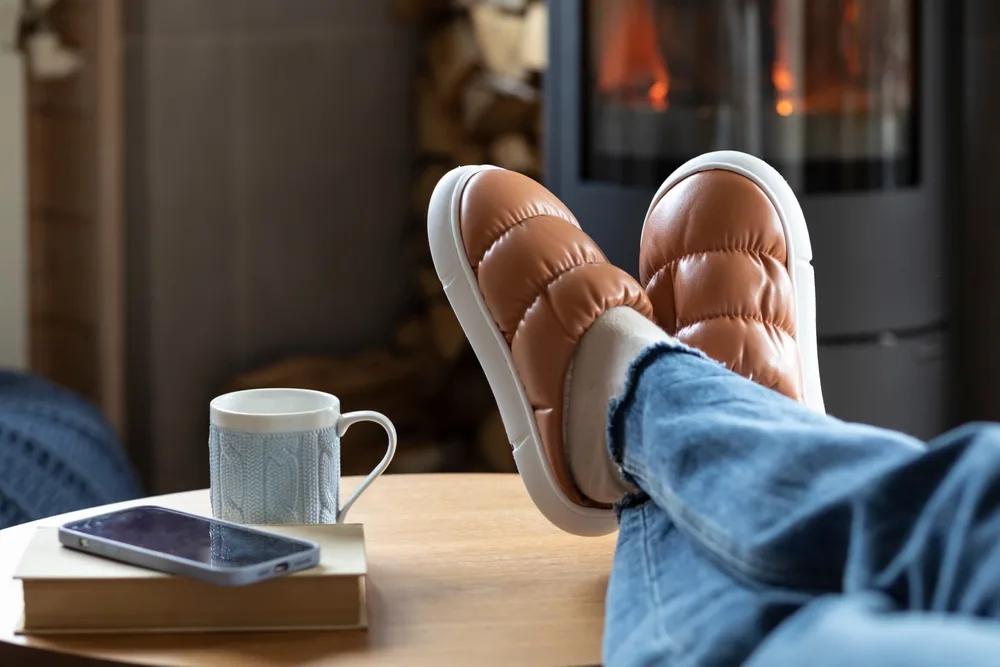 A person sitting with their feet up.